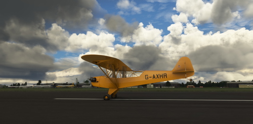 Piper L-4 Grasshopper G-AXHR yellow