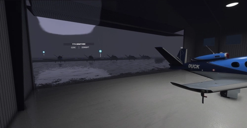 Hangar with animated bifold door