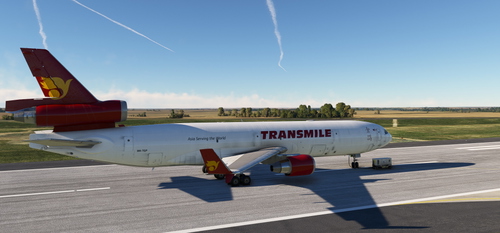 TFDI MD-11F PW Transmile [9M-TGP]